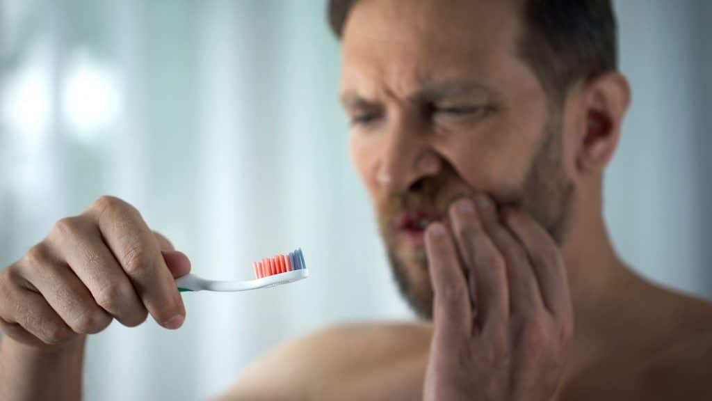 sangrado al cepillar en clínica dental acedo